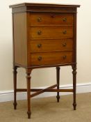 Edwardian inlaid mahogany music cabinet with four integral fall front drawers on square supports