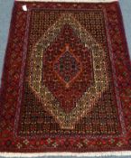 Kashkeen wool rug, central octagonal motif, repeating border,