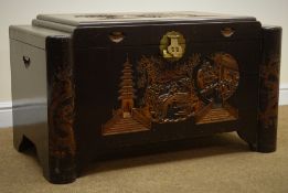 Eastern camphor lined blanket box, carved with figure and landscapes, W101cm, D54cm,