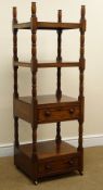 Regency mahogany four tier what-not, with two cockbeaded drawers on brass castors, W46cm, H137cm,