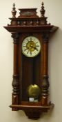 Victorian walnut cased Vienna wall clock, with turned finials and cream Roman dial,