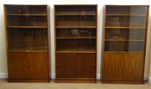 Set of three Herbert Gibb mahogany library bookcase with sliding glass doors, each W91cm, H173cm,