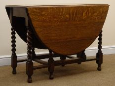 Early 20th century oval oak barley twist gate leg table, W107cm, H75cm,