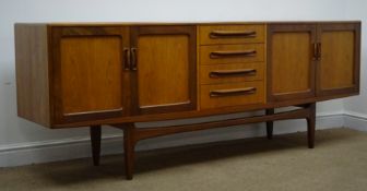 G-Plan teak sideboard, four drawers flanked by two cupboards, tapering supports, W213cm, H80cm,
