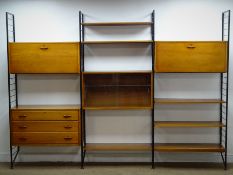 Staples 'Laddarax' black finish three sectional wall unit, six shelves, one chest of three drawers,