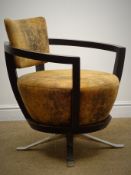Mid 20th century ebonised framed swivel chair, upholstered back and seat, chrome finish supports,