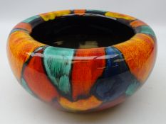 Poole pottery Concave bowl decorated in the Harlequin pattern,