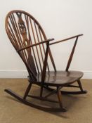 Ercol dark elm stick back rocking armchair with contemporary Prince of Wales feathers pierced splat,