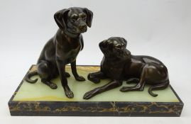 Art Deco pair bronzed spelter seated Labrador's mounted on onyx and marble rectangular plinth,