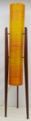 1970s teak framed floor standing 'Rocket' lamp, cylindrical fibreglass shade on tapering supports,