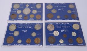 George V and George VI coins in four display cards/folders including King George V 1914 threepence,