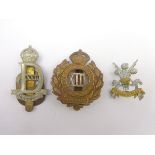 Seven cap badges - 22nd Dragoons, POW 3rd Carabiniers, 13th Hussars, 19th Hussars,