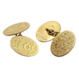 Pair of 9ct gold cufflinks, scroll decoration, Birmingham 1916,