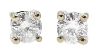 Pair of 18ct white gold diamond stud earrings, 750, diamonds total weight 0.