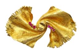 18ct gold scarf brooch, set with six rubies, stamped 750 Condition Report 13gm gross,