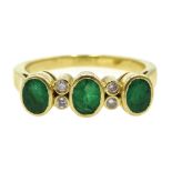 Gold three stone emerald and four stone diamond ring,