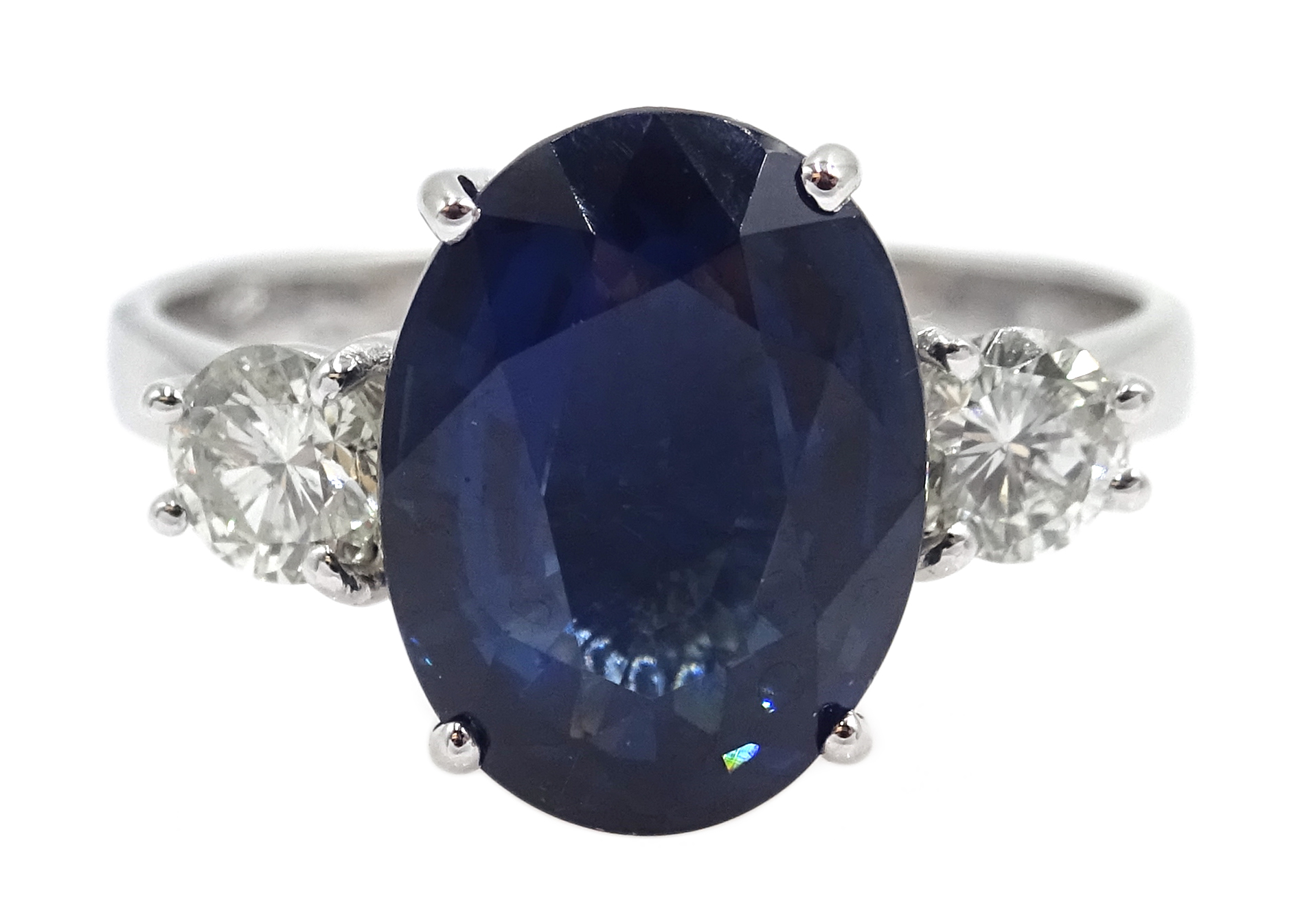 White gold three stone oval sapphire and round brilliant cut diamond ring, hallmarked,