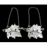 Shop stock: Pair of silver Brandy and Sherry decanter labels in the form of vine leaves by L R