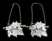 Shop stock: Pair of silver Brandy and Sherry decanter labels in the form of vine leaves by L R
