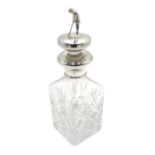 Shop stock: Silver mounted heavy cut glass decanter with golfer stopper 17cm Condition