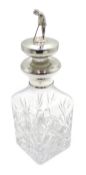 Shop stock: Silver mounted heavy cut glass decanter with golfer stopper 17cm Condition