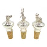 Shop stock: Silver bottle stoppers in the form of a dog's head,
