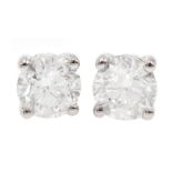 Pair of 18ct white gold diamond stud earrings, stamped 750, diamond total weight 2.