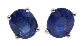 Pair of 18ct gold oval sapphire stud earrings,