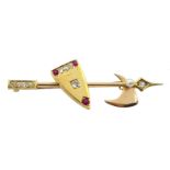 Victorian gold shield and axe bar brooch, set with three rubies, eight diamonds and a pearl,