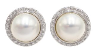 Pair of 18ct white gold mabe pearl and diamond stud earrings,