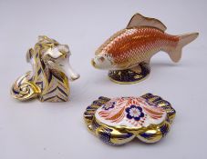 Three Royal Crown Derby paperweights: Carp dated 1986, Seahorse dated 1992 and Crab dated 1988,