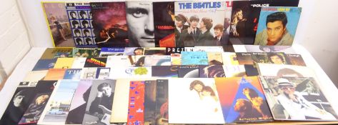 Quantity of rock and pop vinyl LPs incl The Beatles, Neil Diamond, Queen, Rolling Stones,