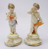 Pair early 20th century Meissen porcelain figures of Cupid from the M Series stamped M 101 & M 102