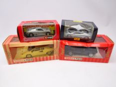 Four boxed large scale die-cast models: two Tonka Polistil Lamborghini's,