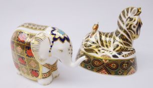 Two Royal Crown Derby paperweights: Zebra dated 1995 and Elephant dated 1990,