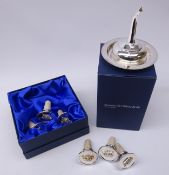Shop stock: silver-plated wine funnel and stand and a set of six cork bottle stoppers,