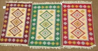 Set of three Turkish rugs with triple medallion centre,