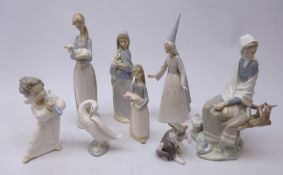 Eight Lladro figures comprising Shepherdess with bird on branch no. 4576, Fairy Godmother no.
