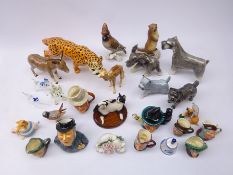 Three Beswick figures comprising Cheetah, Camel Foal and Donkey, Goebel figure of a terrier,