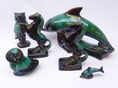 Six pieces of Canadian Blue Mountain Pottery including large dolphin L40cm, dolphin calf,