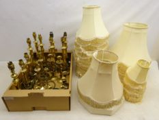 Five pairs of brass candlestick lamps, three pairs of brass candlesticks,