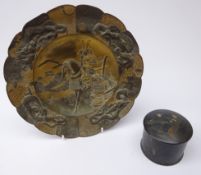 Japanese bronzed plate, cast in relief with armour-clad warrior on horseback, D24.