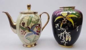Silver overlay porcelain coffee pot by Friedrich Deusch, painted with a Hummingbird amongst trees,