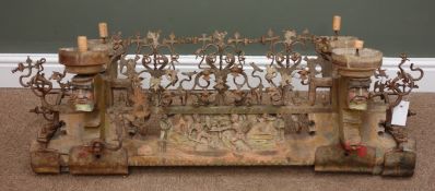19th century softwood carved, wrought metal scrolled cresting rail, flanked by four candle holders,