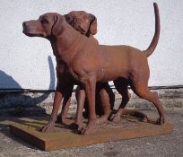 Pair cast iron dogs, one seated and one standing,