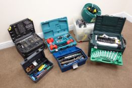 Makita 8391D cordless drill set, a drill bit set, spanner and socket set,