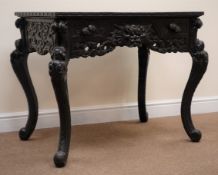 Early 20th century Chinese table, frieze carved with mythical creature with four drawers,