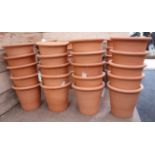 Twenty circular tapering terracotta flower pots, D34cm,