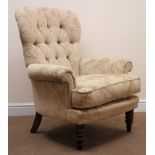 Victorian style salon armchair, upholstered in deep buttoned beige fabric, scrolled arms,