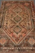 Persian style brown ground rug,